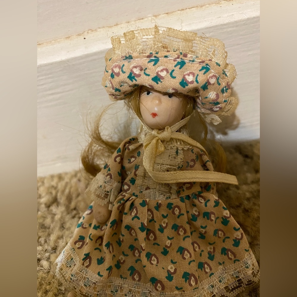Tiny Porcelain Doll